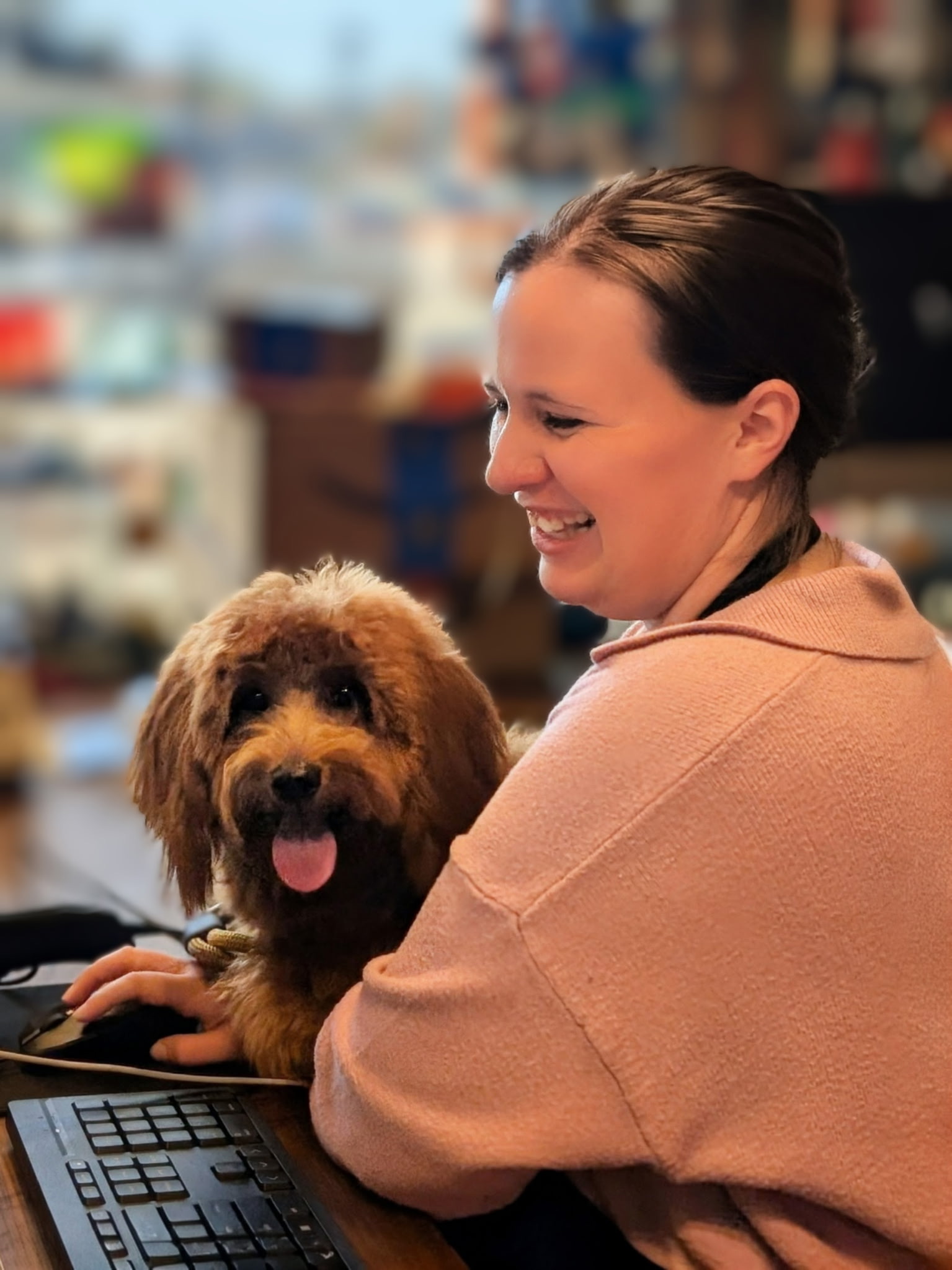 Earthwise Pet South Lamar staff smiling with a happy doodle at the register
